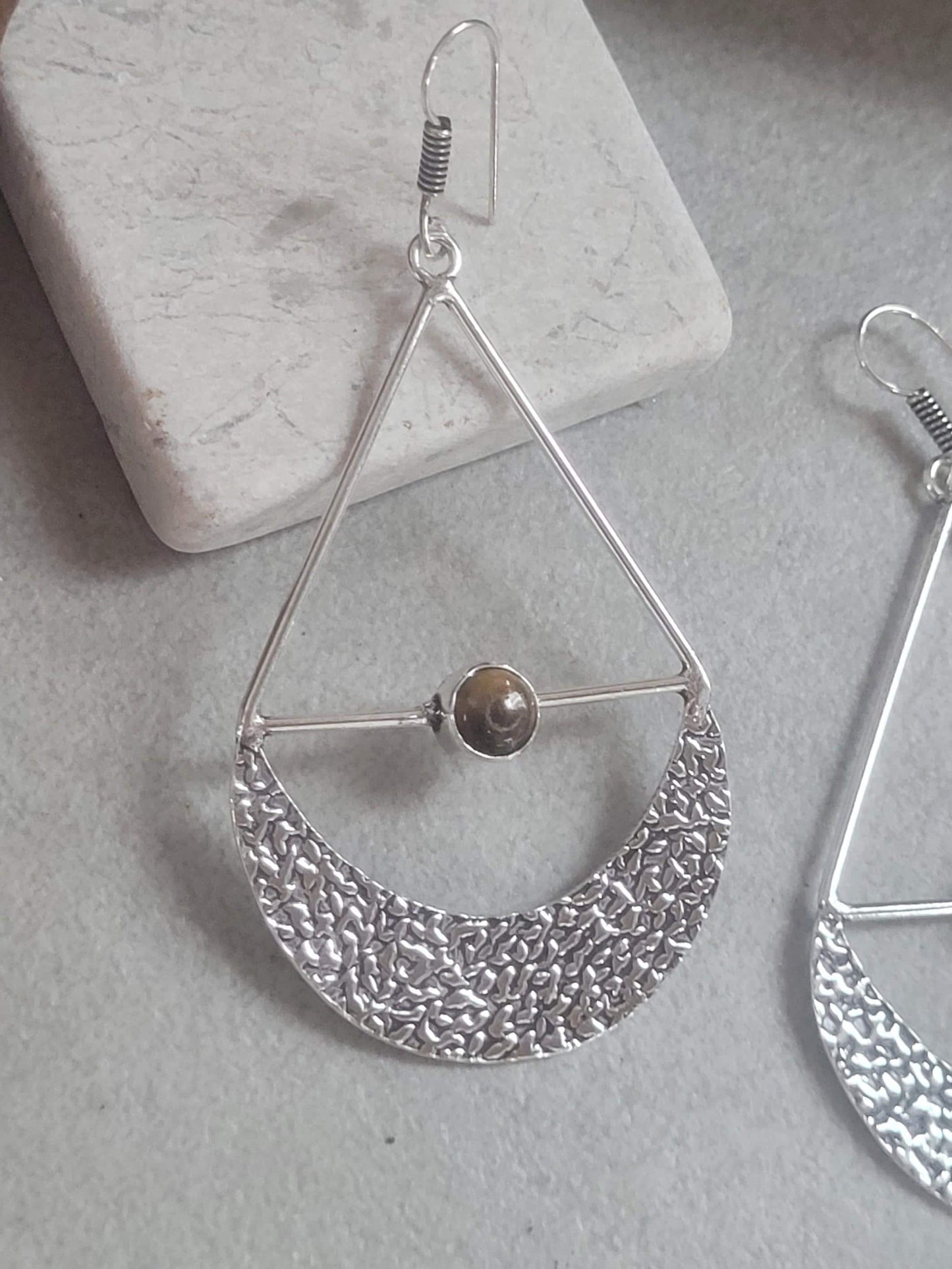 Silver dangle drop earrings: Statement jewellery
