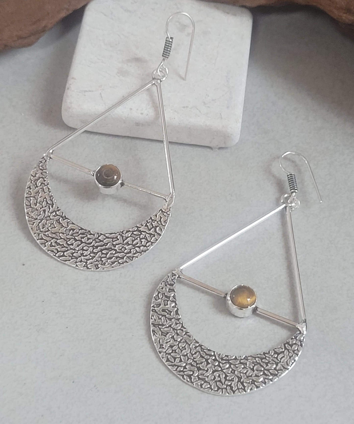 Silver dangle drop earrings: Statement jewellery
