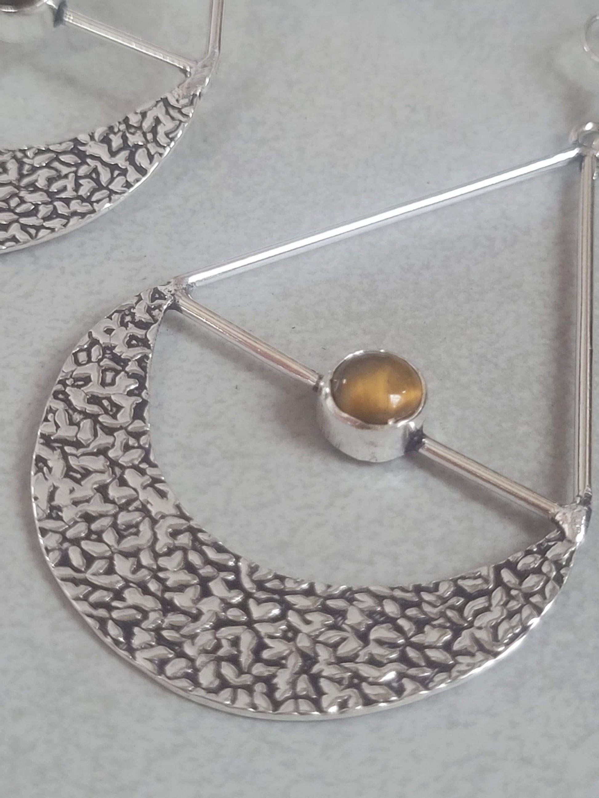 Silver dangle drop earrings: Statement jewellery