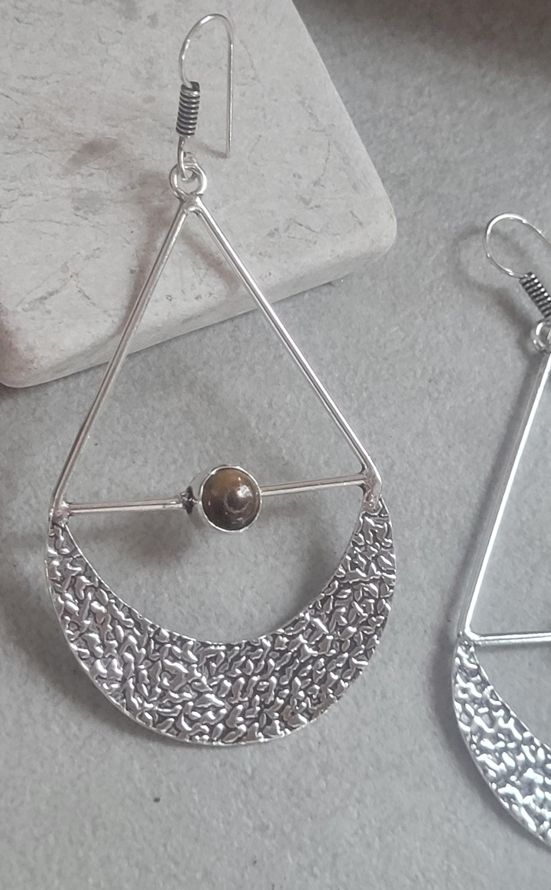 Silver dangle drop earrings: Statement jewellery