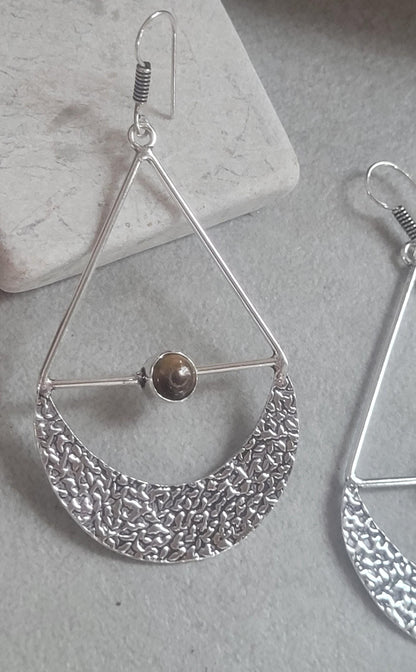 Silver dangle drop earrings: Statement jewellery