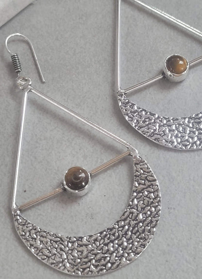 Silver dangle drop earrings: Statement jewellery