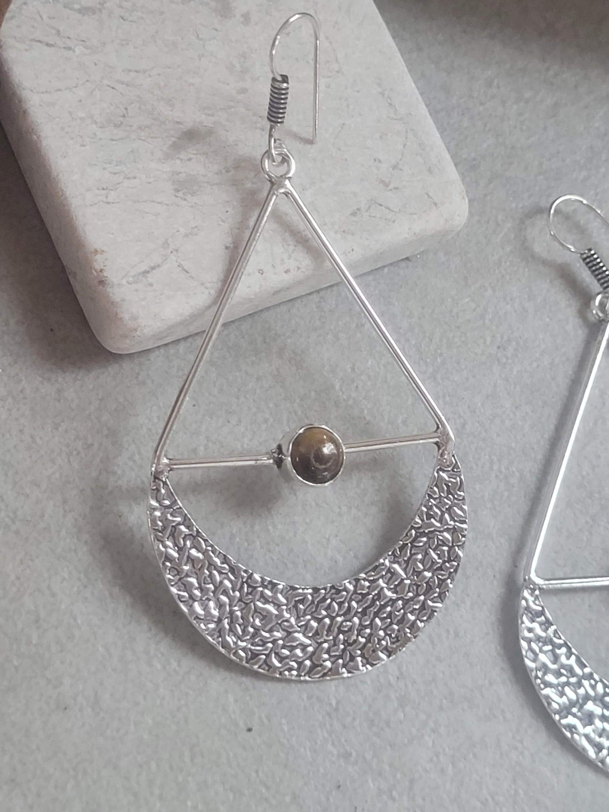 Silver dangle drop earrings: Statement jewellery