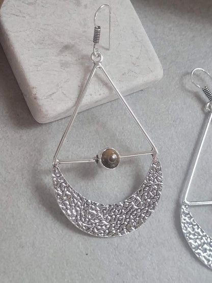 Silver dangle drop earrings: Statement jewellery