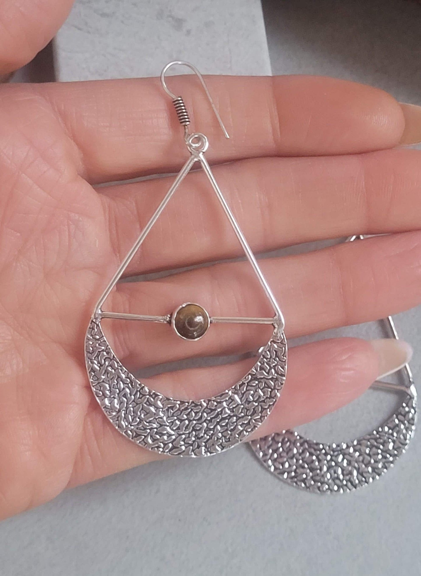 Silver dangle drop earrings: Statement jewellery